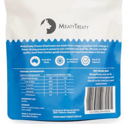 Back of a MeatyTreaty pet food bag showing product information, nutrition facts, storage instructions, and a barcode on a white and blue background.